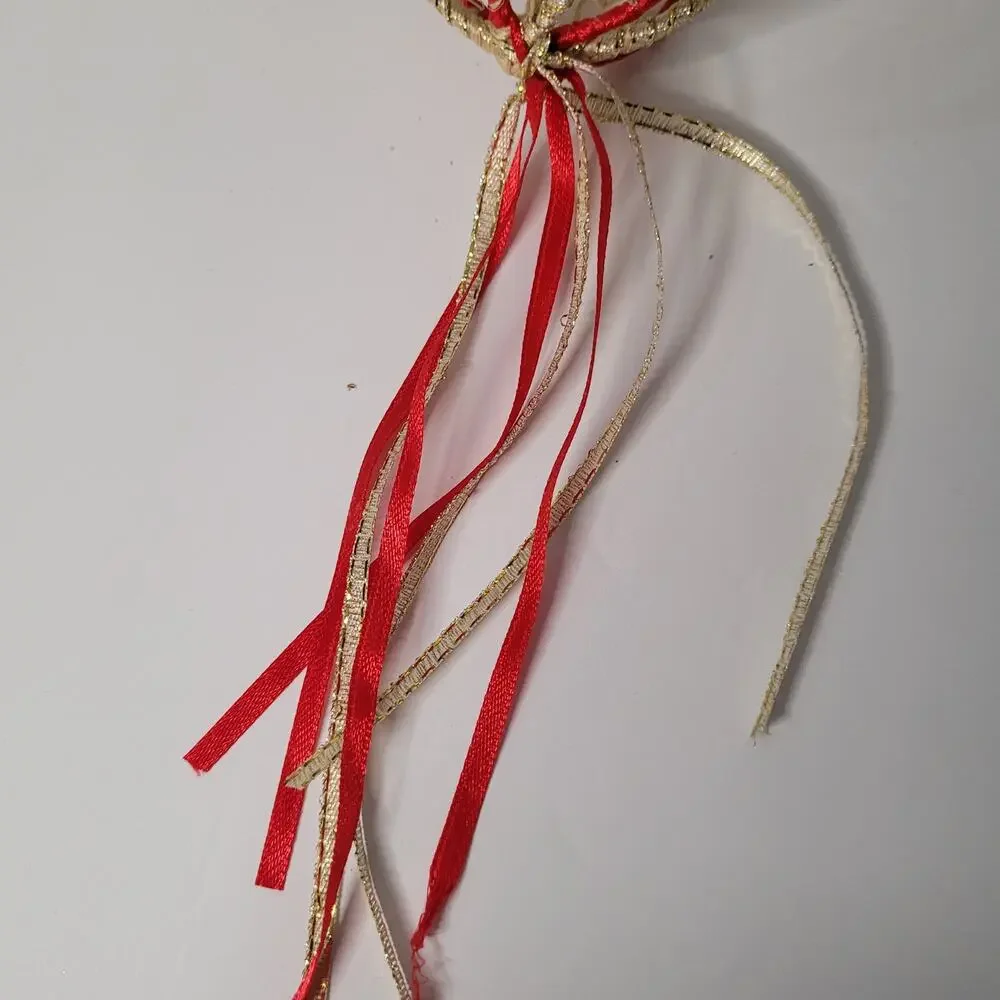 Festive Ornament with Gold Ribbon and Tassels